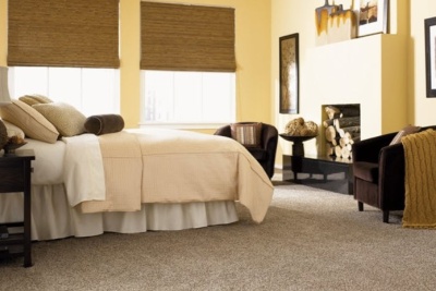 How to style carpet in a bedroom space
